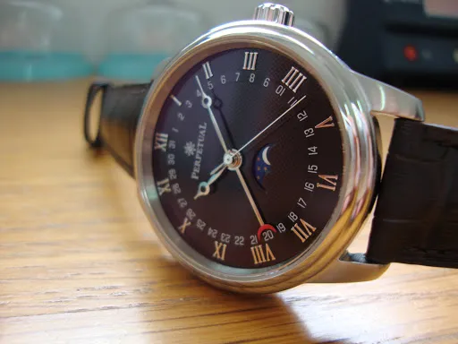 Đồng hồ PerpetuaL Pointer Date/Moonphase PM